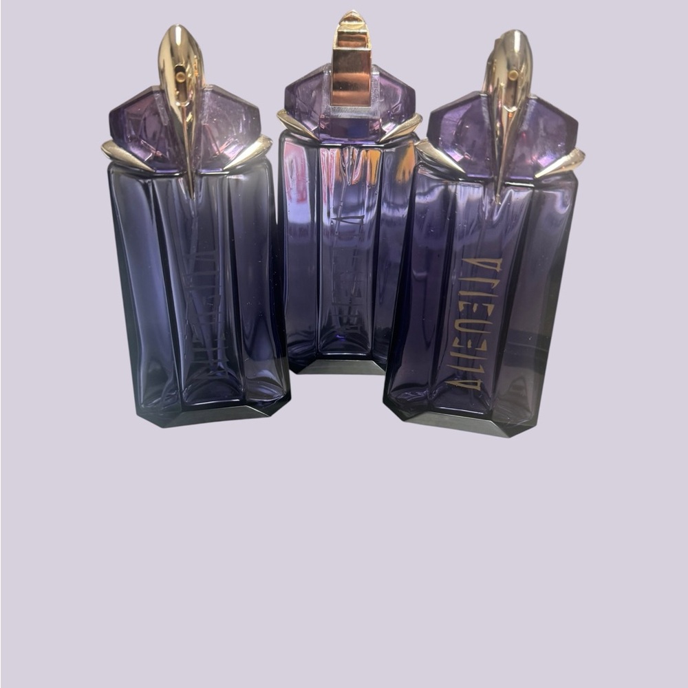 Thierry Mugler Purple and Gold Perfume bottles alien